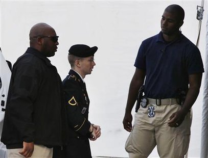U.S. soldier Bradley Manning (C) arrives to receive his sentence at Fort Meade in Maryland, August 21, 2013.
REUTERS/Larry Downing U.S. soldier Bradley Manning (C) arrives to receive his sentence at Fort Meade in Maryland, August 21, 2013.
REUTERS/Larry Downing
