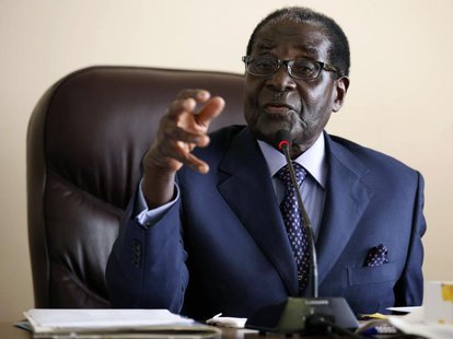 Zimbabwe's President Robert Mugabe gestures while addressing a meeting of his ZANU PF party's supreme decision making body in Harare August Zimbabwe's President Robert Mugabe gestures while addressing a meeting of his ZANU PF party's supreme decision making body in Harare August
