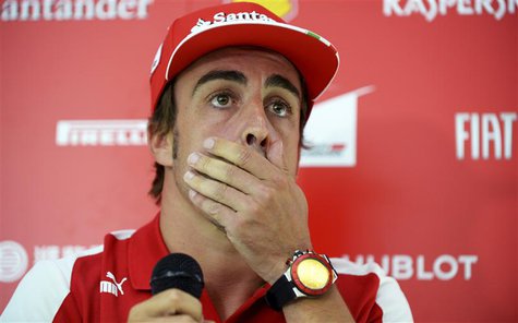 Ferrari Formula One driver Fernando Alonso of Spain reacts as he talks to the media ahead of the weekend's Belgian F1 Grand Prix in Spa-Fran Ferrari Formula One driver Fernando Alonso of Spain reacts as he talks to the media ahead of the weekend's Belgian F1 Grand Prix in Spa-Fran