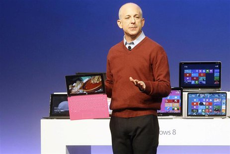 Windows' and Windows Live Division President, Steven Sinofsky, holds a Surface tablet computer as he introduces the new Windows 8 operating Windows' and Windows Live Division President, Steven Sinofsky, holds a Surface tablet computer as he introduces the new Windows 8 operating