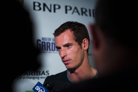 Tennis player Andy Murray of Britain speaks with the media as he attends an event announcing his participation in the 7th annual BNP Paribas Tennis player Andy Murray of Britain speaks with the media as he attends an event announcing his participation in the 7th annual BNP Paribas