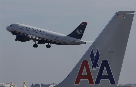 A U.S. Airways jet departs Washington's Reagan National Airport next to American Airlines jets outside Washington, in this February 25, 2013 A U.S. Airways jet departs Washington's Reagan National Airport next to American Airlines jets outside Washington, in this February 25, 2013