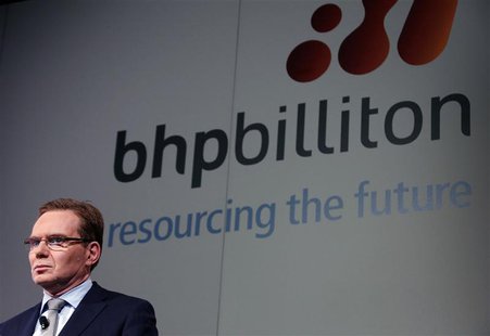 BHP Billiton Chief Executive Andrew Mackenzie prepares to discuss the company's annual results at a meeting in Sydney August 20, 2013. REUTE BHP Billiton Chief Executive Andrew Mackenzie prepares to discuss the company's annual results at a meeting in Sydney August 20, 2013. REUTE