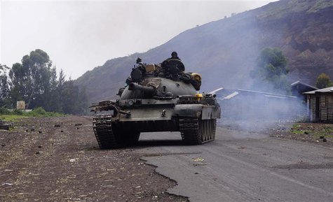 A Congolese government military tank patrols in Kanyarucinya village in the outskirts of Goma in the eastern Democratic Republic of Congo, A A Congolese government military tank patrols in Kanyarucinya village in the outskirts of Goma in the eastern Democratic Republic of Congo, A