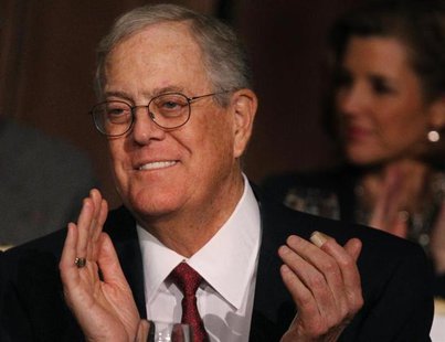David Koch, executive vice president of Koch Industries, applauds during an Economic Club of New York event in New York, December 10, 2012. David Koch, executive vice president of Koch Industries, applauds during an Economic Club of New York event in New York, December 10, 2012.