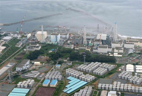 An aerial view shows Tokyo Electric Power Co. (TEPCO)'s tsunami-crippled Fukushima Daiichi nuclear power plant and its contaminated water st An aerial view shows Tokyo Electric Power Co. (TEPCO)'s tsunami-crippled Fukushima Daiichi nuclear power plant and its contaminated water st
