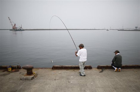 Local residents fish at Onahama port in Iwaki, about 61 km (38 miles) south of the tsunami-crippled Fukushima Daiichi nuclear power plant, F Local residents fish at Onahama port in Iwaki, about 61 km (38 miles) south of the tsunami-crippled Fukushima Daiichi nuclear power plant, F