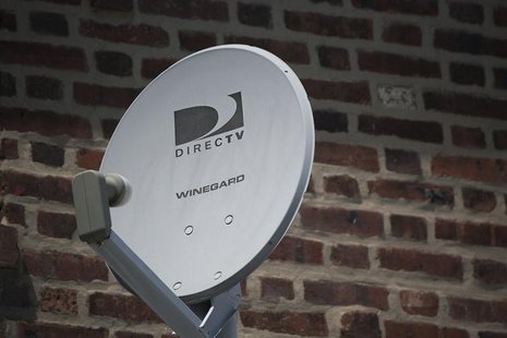 A Direct TV dish is seen outside a home in the Queens borough of New York July 29, 2013. REUTERS/Shannon Stapleton A Direct TV dish is seen outside a home in the Queens borough of New York July 29, 2013. REUTERS/Shannon Stapleton