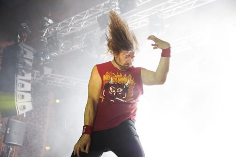 Winner Eric "Mean Melin" Melin of the U.S. performs during the 2013 Air Guitar World Championships in Oulu August 23, 2013. REUTERS/Timo Hei Winner Eric "Mean Melin" Melin of the U.S. performs during the 2013 Air Guitar World Championships in Oulu August 23, 2013. REUTERS/Timo Hei