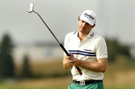 Keegan Bradley of the U.S. reacts to a missed putt on the 12th green during the weather delayed first round of the Barclays PGA golf tournam Keegan Bradley of the U.S. reacts to a missed putt on the 12th green during the weather delayed first round of the Barclays PGA golf tournam