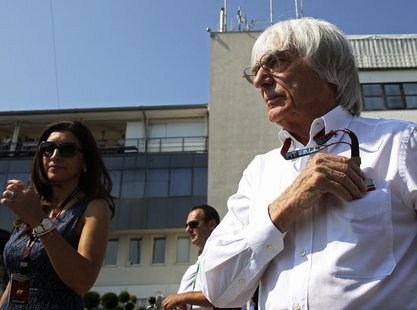 Formula One supremo Bernie Ecclestone (R) is pictured during the third practice session of the Hungarian F1 Grand Prix at the Hungaroring ci Formula One supremo Bernie Ecclestone (R) is pictured during the third practice session of the Hungarian F1 Grand Prix at the Hungaroring ci
