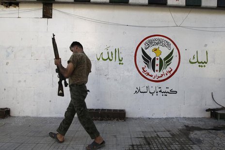 A member of the 'Liwaa Ahrar Suriya' brigade, operating under the Free Syrian Army, is seen in Sakhour area, Aleppo August 24, 2013. REUTERS A member of the 'Liwaa Ahrar Suriya' brigade, operating under the Free Syrian Army, is seen in Sakhour area, Aleppo August 24, 2013. REUTERS