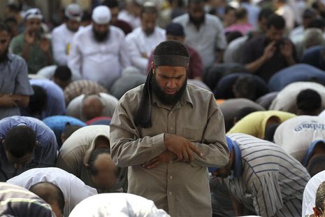 Supporters of Muslim Brotherhood and ousted Egyptian President Mohamed Mursi pray during a protest in Cairo August 23, 2013. REUTERS/Muhamma Supporters of Muslim Brotherhood and ousted Egyptian President Mohamed Mursi pray during a protest in Cairo August 23, 2013. REUTERS/Muhamma