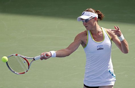 Sam Stosur of Australia hits a return to Jelena Jankovic of Serbia during their women's singles quarter-final match at the WTA Dubai Tennis Sam Stosur of Australia hits a return to Jelena Jankovic of Serbia during their women's singles quarter-final match at the WTA Dubai Tennis