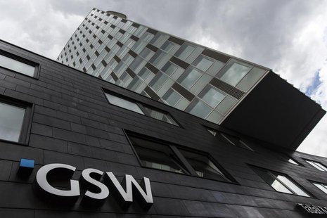 The logo of the GSW property firm is seen at its headquarters in Berlin, August 20, 2013. Deutsche Wohnen offered to buy rival property grou The logo of the GSW property firm is seen at its headquarters in Berlin, August 20, 2013. Deutsche Wohnen offered to buy rival property grou