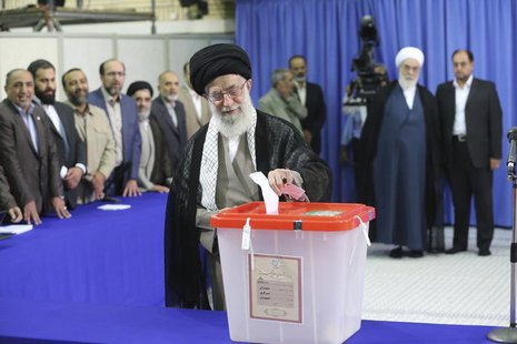 Iran's Supreme Leader Ayatollah Ali Khamenei casts his ballot at his office during the Iranian presidential election in central Tehran June Iran's Supreme Leader Ayatollah Ali Khamenei casts his ballot at his office during the Iranian presidential election in central Tehran June