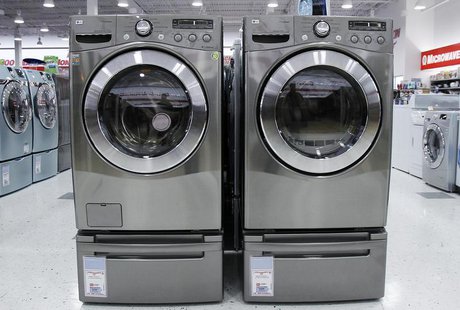 Washers and dryers are seen on display at a store in New York July 28, 2010. REUTERS/Shannon Stapleton Washers and dryers are seen on display at a store in New York July 28, 2010. REUTERS/Shannon Stapleton