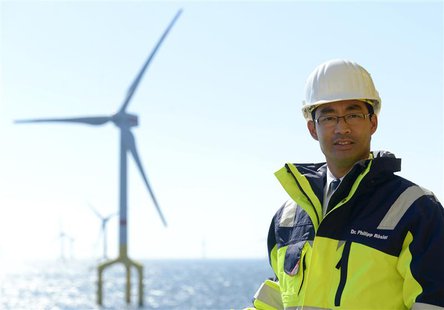 German Economy Minister Philipp Roesler poses for media in front of windmills of the wind farm BARD Offshore 1, located 100 kilometres north German Economy Minister Philipp Roesler poses for media in front of windmills of the wind farm BARD Offshore 1, located 100 kilometres north