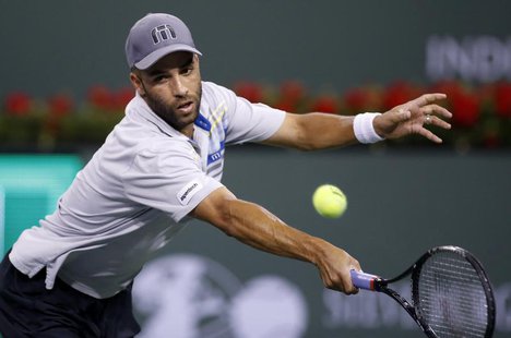 James Blake of the U.S. returns a shot against Jo-Wilfried Tsonga of France during their match at the BNP Paribas Open ATP tennis tournament James Blake of the U.S. returns a shot against Jo-Wilfried Tsonga of France during their match at the BNP Paribas Open ATP tennis tournament
