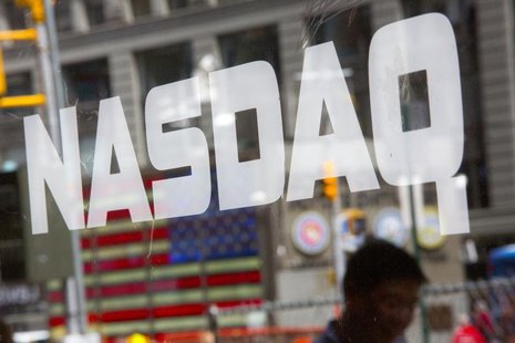 A man walks past the Nasdaq MarketSite in New York's Times Square, August 23, 2013. REUTERS/Andrew Kelly A man walks past the Nasdaq MarketSite in New York's Times Square, August 23, 2013. REUTERS/Andrew Kelly