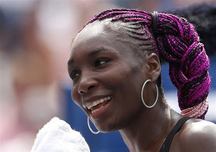 Venus Williams of the U.S. smiles after her victory over Kirsten Flipkens of Belgium at the U.S. Open tennis chammpionships in New York, Aug Venus Williams of the U.S. smiles after her victory over Kirsten Flipkens of Belgium at the U.S. Open tennis chammpionships in New York, Aug