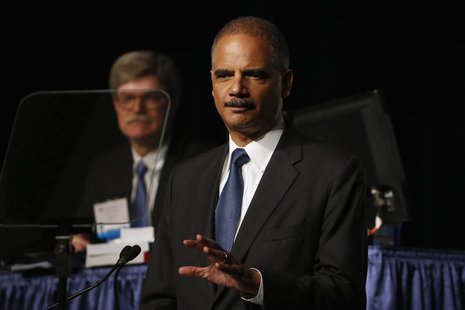 U.S. Attorney General Eric Holder speaks on stage during the annual meeting of the American Bar Association in San Francisco, California Aug U.S. Attorney General Eric Holder speaks on stage during the annual meeting of the American Bar Association in San Francisco, California Aug