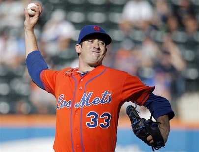 New York Mets starting pitcher Matt Harvey throws a pitch to the Detroit Tigers in the third inning of their MLB inter-league baseball game New York Mets starting pitcher Matt Harvey throws a pitch to the Detroit Tigers in the third inning of their MLB inter-league baseball game
