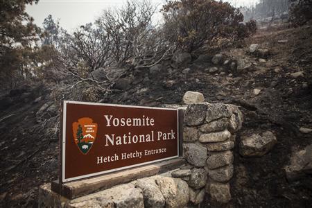 A sign on the edge of Yosemite National Park, California, is surrounded by a burn from the Rim Fire, August 23, 2013.
REUTERS/Max Whittaker A sign on the edge of Yosemite National Park, California, is surrounded by a burn from the Rim Fire, August 23, 2013.
REUTERS/Max Whittaker