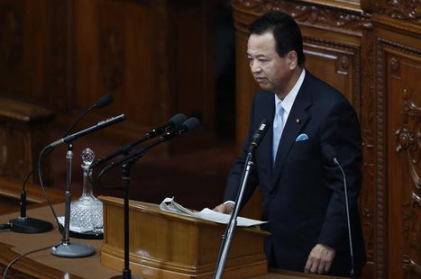 Japan's Economics Minister Akira Amari delivers his policy speech at the lower house of parliament in Tokyo February 28, 2013. REUTERS/Issei Japan's Economics Minister Akira Amari delivers his policy speech at the lower house of parliament in Tokyo February 28, 2013. REUTERS/Issei