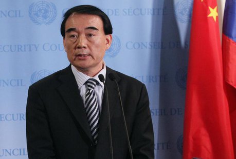 Li Baodong speaks with the media after Security Council consultations at U.N. headquarters in New York June 7, 2012. REUTERS/Allison Joyce Li Baodong speaks with the media after Security Council consultations at U.N. headquarters in New York June 7, 2012. REUTERS/Allison Joyce