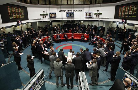 Traders and clerks react on the floor of the London Metal Exchange in the City of London February 14, 2012. REUTERS/Luke MacGregor Traders and clerks react on the floor of the London Metal Exchange in the City of London February 14, 2012. REUTERS/Luke MacGregor