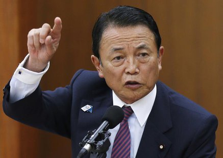 Japan's Finance Minister Taro Aso speaks during a semi-annual parliament hearing on monetary policy at the Lower House of the parliament in Japan's Finance Minister Taro Aso speaks during a semi-annual parliament hearing on monetary policy at the Lower House of the parliament in