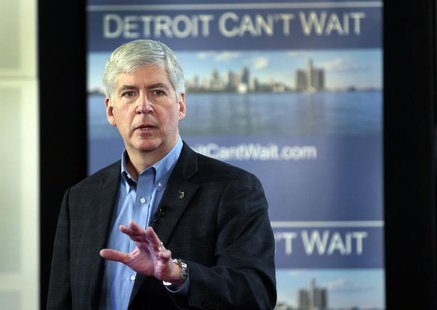 Michigan Governor Rick Snyder talks about the city of Detroit being in a financial emergency state during a meeting with an invited audience Michigan Governor Rick Snyder talks about the city of Detroit being in a financial emergency state during a meeting with an invited audience