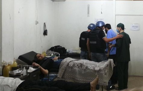 U.N. chemical weapons experts visit a hospital where wounded people affected by an apparent gas attack are being treated, in the southwester U.N. chemical weapons experts visit a hospital where wounded people affected by an apparent gas attack are being treated, in the southwester