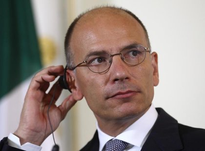 Italy's Prime Minister Enrico Letta listens during a news conference in Vienna August 21, 2013. REUTERS/Heinz-Peter Bader Italy's Prime Minister Enrico Letta listens during a news conference in Vienna August 21, 2013. REUTERS/Heinz-Peter Bader