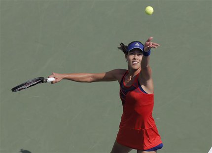 Ana Ivanovic of Serbia serves to Anna Tatishvili of Georgia at the U.S. Open tennis championships in New York August 27, 2013. REUTERS/Ray S Ana Ivanovic of Serbia serves to Anna Tatishvili of Georgia at the U.S. Open tennis championships in New York August 27, 2013. REUTERS/Ray S