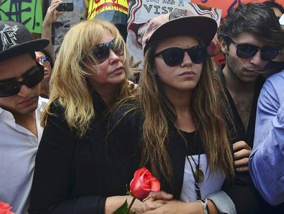 Jacqueline Llach (center L), the mother of graffiti artist Israel Hernandez-Llach, who died after being shocked by a police officer's Taser, Jacqueline Llach (center L), the mother of graffiti artist Israel Hernandez-Llach, who died after being shocked by a police officer's Taser,