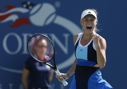 Caroline Wozniacki of Denmark celebrates after winning match point against Duan Ying-Ying of China at the U.S. Open tennis championships in Caroline Wozniacki of Denmark celebrates after winning match point against Duan Ying-Ying of China at the U.S. Open tennis championships in