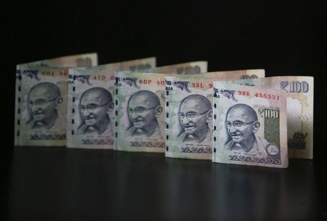 Indian Rupee notes are seen in this picture illustration taken in Mumbai June 12, 2013. REUTERS/Vivek Prakash Indian Rupee notes are seen in this picture illustration taken in Mumbai June 12, 2013. REUTERS/Vivek Prakash
