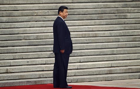China's President Xi Jinping waits for his Palestinian counterpart Mahmoud Abbas before a welcoming ceremony outside the Great Hall of the P China's President Xi Jinping waits for his Palestinian counterpart Mahmoud Abbas before a welcoming ceremony outside the Great Hall of the P