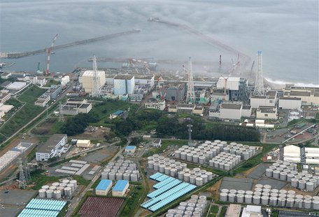 An aerial view shows Tokyo Electric Power Co. (TEPCO)'s tsunami-crippled Fukushima Daiichi nuclear power plant and its contaminated water st An aerial view shows Tokyo Electric Power Co. (TEPCO)'s tsunami-crippled Fukushima Daiichi nuclear power plant and its contaminated water st