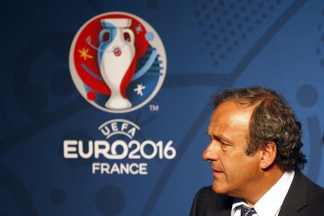 Michel Platini, UEFA President reacts in front of the UEFA EURO 2016 logo at a news conference in Paris June 26, 2013. REUTERS/Charles Plati Michel Platini, UEFA President reacts in front of the UEFA EURO 2016 logo at a news conference in Paris June 26, 2013. REUTERS/Charles Plati