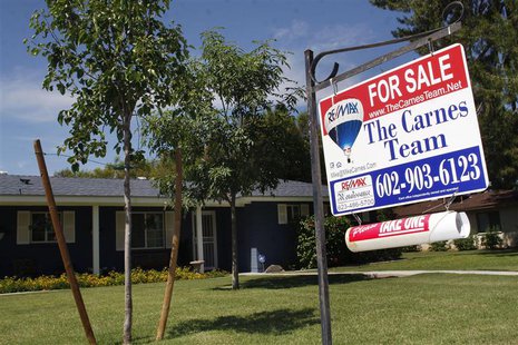 A real estate sales sign sits outside of a house for sale in Phoenix, Arizona June 2, 2009. REUTERS/Joshua Lott A real estate sales sign sits outside of a house for sale in Phoenix, Arizona June 2, 2009. REUTERS/Joshua Lott