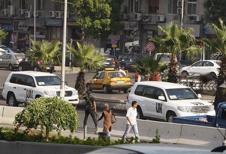 U.N. vehicles, carrying a team of United Nations chemical weapons experts, return to their hotel in Damascus August 28, 2013. REUTERS/Khaled U.N. vehicles, carrying a team of United Nations chemical weapons experts, return to their hotel in Damascus August 28, 2013. REUTERS/Khaled