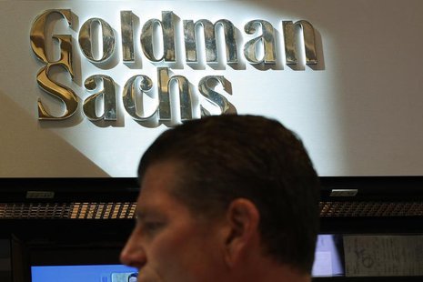 A trader works inside the Goldman Sachs stall on the floor at the New York Stock Exchange July 16, 2013. REUTERS/Brendan McDermid A trader works inside the Goldman Sachs stall on the floor at the New York Stock Exchange July 16, 2013. REUTERS/Brendan McDermid