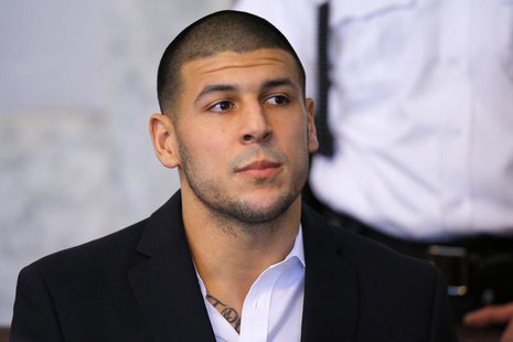 Aaron Hernandez, former player for the NFL's New England Patriots football team, listens during a hearing at Attleboro District Court in Att Aaron Hernandez, former player for the NFL's New England Patriots football team, listens during a hearing at Attleboro District Court in Att