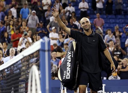 James Blake of the U.S. waves to the crowd after losing to Ivo Karlovic of Croatia at the U.S. Open tennis championships in New York August James Blake of the U.S. waves to the crowd after losing to Ivo Karlovic of Croatia at the U.S. Open tennis championships in New York August