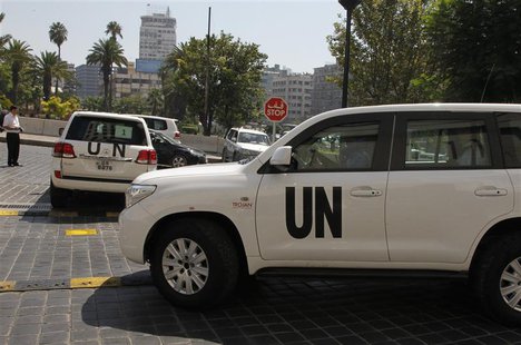 U.N. vehicles carrying a team of United Nations chemical weapons experts leave the hotel where they are staying at in Damascus August 29, 20 U.N. vehicles carrying a team of United Nations chemical weapons experts leave the hotel where they are staying at in Damascus August 29, 20