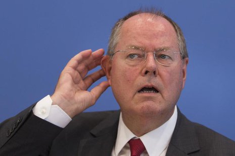 The top candidate of the Social Democratic Party (SPD) in the upcoming German general elections, Peer Steinbrueck, gestures during a news co The top candidate of the Social Democratic Party (SPD) in the upcoming German general elections, Peer Steinbrueck, gestures during a news co