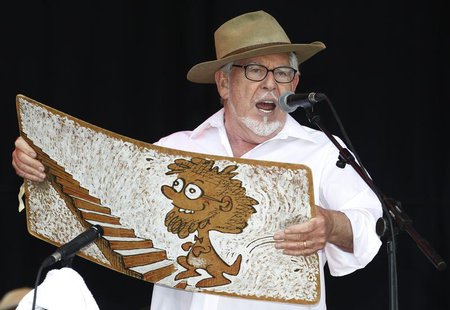 Australian singer Rolf Harris performs with his wobbleboard at the Glastonbury Festival 2010 in south west England, June 25, 2010 file photo Australian singer Rolf Harris performs with his wobbleboard at the Glastonbury Festival 2010 in south west England, June 25, 2010 file photo